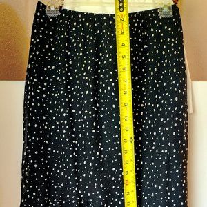 REDUCED 111  Chico's Asymmetrical  Skirt Black/ White Dots. Size 0 or size Small